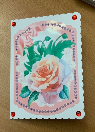 Pretty water colour rose with bow on lace bracket card by Jennie Settle
