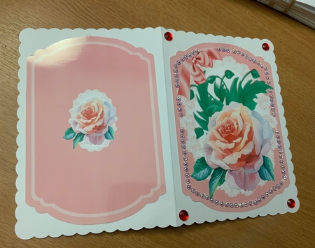 Pretty water colour rose with bow on lace bracket card by Jennie Settle