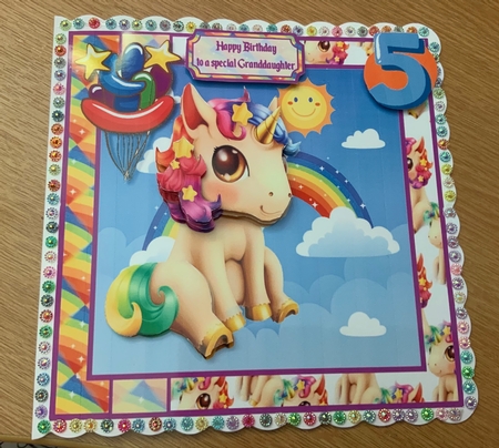 Rainbow Unicorn by Jennie Settle