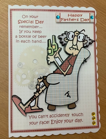 Gus has a beer in each hand by Jennie Settle