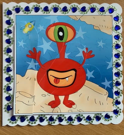Cute Alien Fan Pyramage Topper by Jennie Settle
