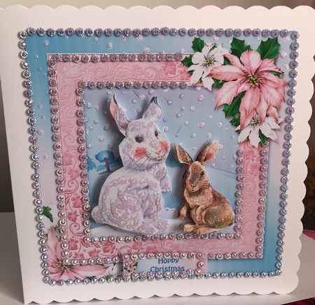 Christmas Rabbits by Jennie Settle