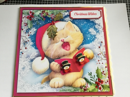 Cute Christmas Kitty Caroler  by Jennie Settle