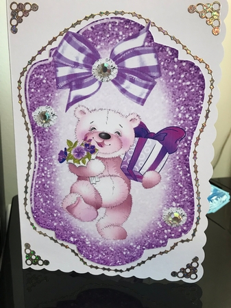 Lovely Teddy with presents and purple bow Card front & insert A5 by Jennie Settle