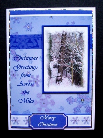 Christmas Greetings from Across the Miles (blue) - A5 by Jennifer (Jaye) Smith-Kirk