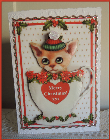 Christmas Cat In A Cup by Jennifer weary
