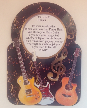 An Ode to Guitars by Jennifer Archer