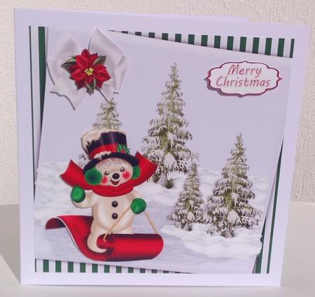 Snowman Having Fun in the Snow on a Sledge 8x8 by Jennifer Archer