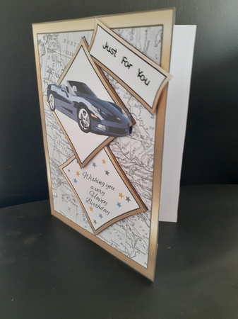 Two squares Blue sports car by Jenny Caldwell