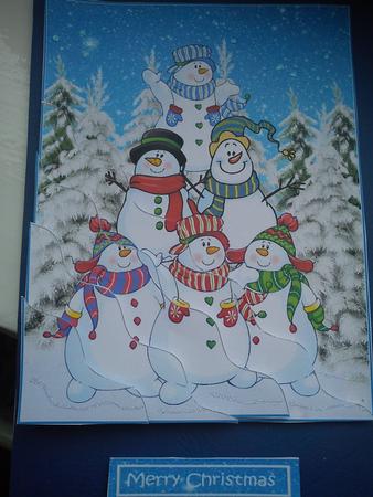 A Pile of Snowmen Side Stacker by Jenny Walton