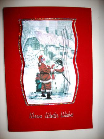 Santa Keeping the Snowman Warm by Jill Duncanson