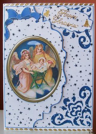 Nativity in Glass on Blue Scalloped Envelope by Joan Mary Smith