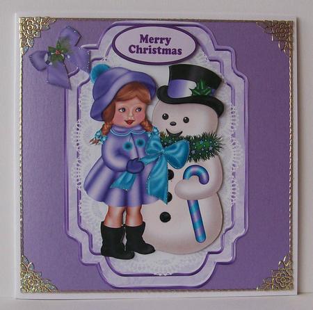 Snowman with Little Girl Dressed for the Winter by Joan Mary Smith