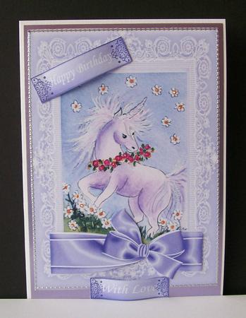 Sweet Little Unicorn with Flowers and Lilac Bow by Joan Mary Smith
