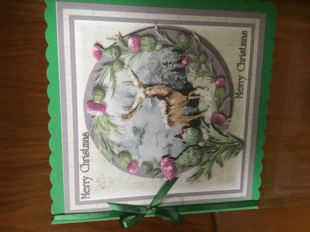 Deer in the snow with thistles Merry Christmas by Joan Murfitt