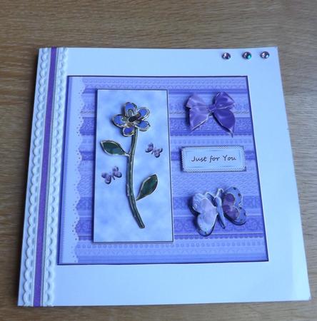 A Purple Flower and Butterflies by Joan Murfitt