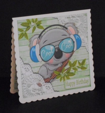 Green Wood and lace corners 8x8 card front by Joan Prince