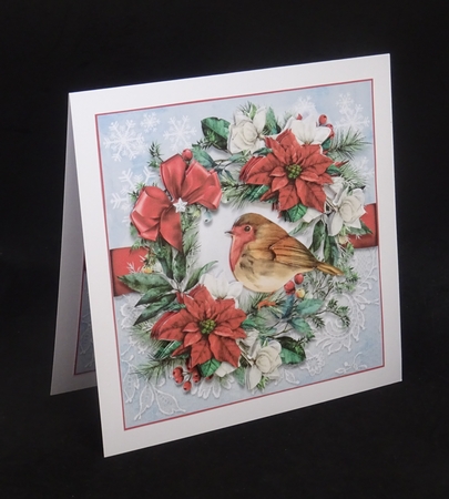 Poinsettia wreath with Robin by Joan Prince