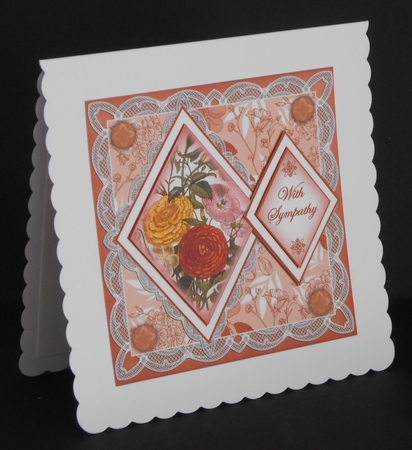 Orange Bouquet with Sympathy 7in Double Diamond Topper by Joan Prince