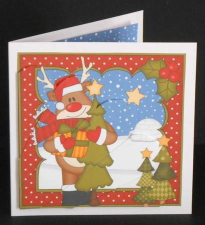 Christmas Rudolph brings home the Christmas Tree Fan Pyramage Topper by Joan Prince