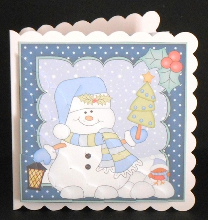 Christmas Snowman Oli has a Christmas Tree Scallop Corner side stacker Topper by Joan Prince