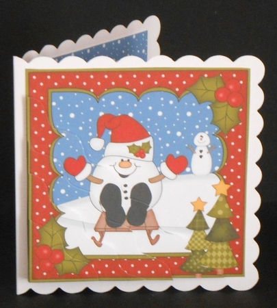 Christmas Snowball Sam goes Sledging Wavy Corner Topper by Joan Prince