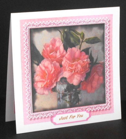 Pale Cerise roses in a lace Mat  by Joan Prince