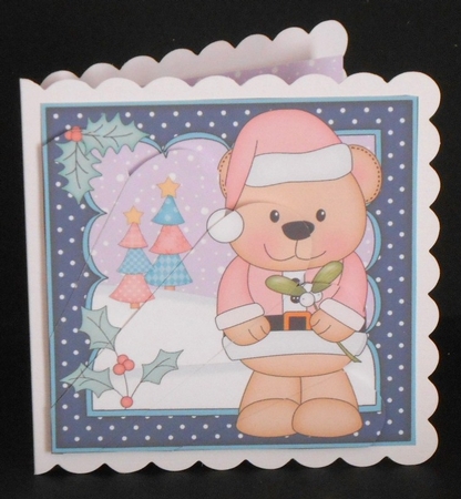 Christmas Livvy Bear has the Mistletoe Fan Pyramage Topper by Joan Prince