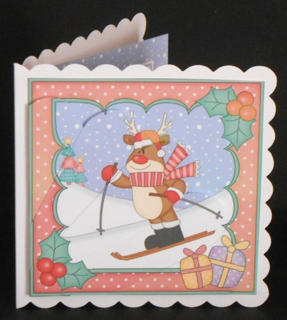 Christmas Rudolph goes Skiing Fan Pyramage Topper by Joan Prince