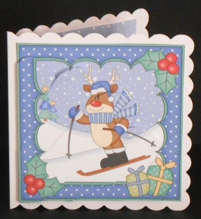 Christmas Rudolph goes Skiing Fan Pyramage Topper by Joan Prince