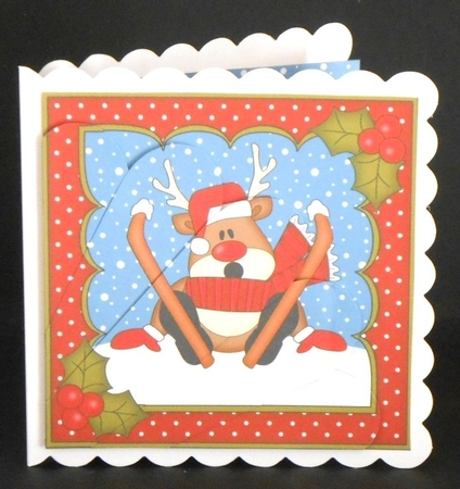 Christmas Rudolph goes Skiing Fan Pyramage Topper by Joan Prince