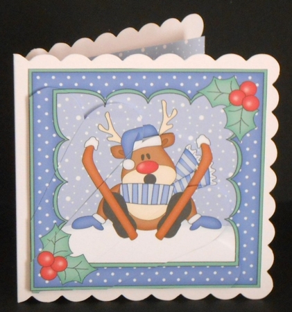 Christmas Rudolph goes Skiing Fan Pyramage Topper by Joan Prince