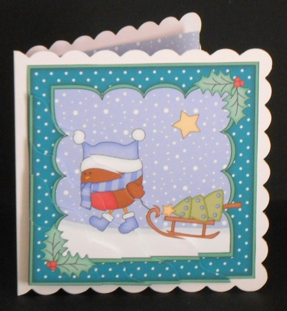 Christmas Bobbin Robin has a Christmas Tree Wavy Corner side stacker Topper by Joan Prince