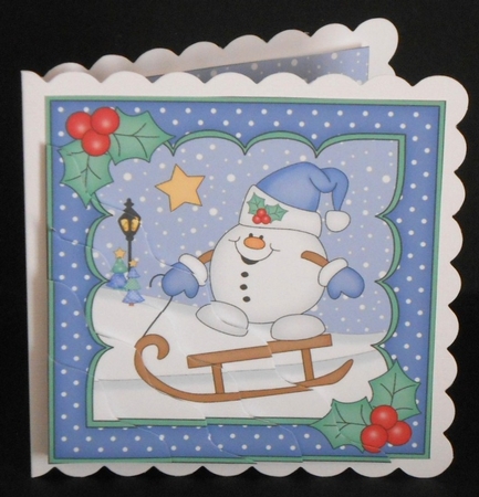 Christmas Snowball Sam is Sledging Wavy Corner Topper by Joan Prince