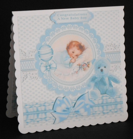 cute little baby boy with his blue teddy and rattle 8x8 by Joan Prince