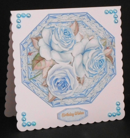 Blue Roses on a Octagonal Mat  by Joan Prince