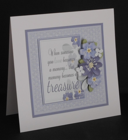 Blue flowers for sympathy by Joan Prince