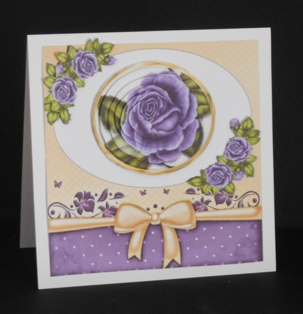 Pretty purple roses, with corner roses circle pyramids by Joan Prince