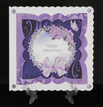 Happy Anniversary Card Front with Lilac Flowers and Bow by Joan Prince