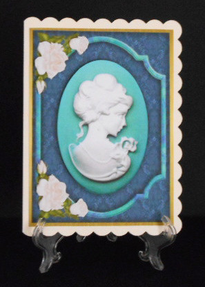 Beautiful Cameo on Teal Frame with Roses  by Joan Prince