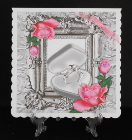 Ornate Frame Edged with Pink Roses and Ring 8x8 by Joan Prince