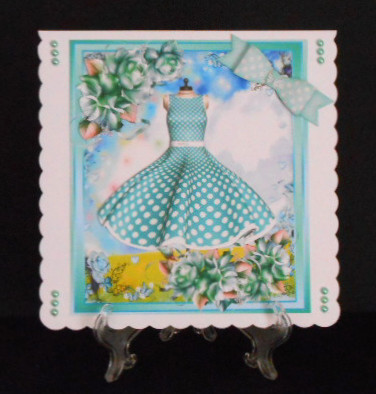 Lovely Turquoise Polka Dot Dress and Roses  by Joan Prince
