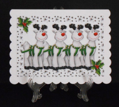 Santas Reindeers with Holly in Star Frame by Joan Prince