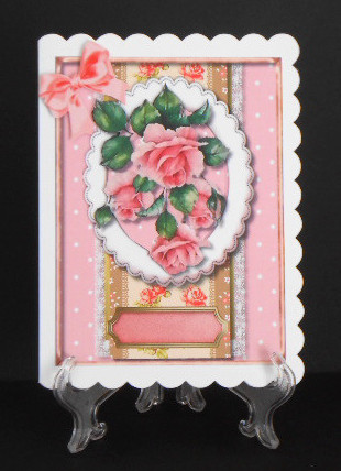 Beaitiful Pink Roses in a Oval Frame  by Joan Prince