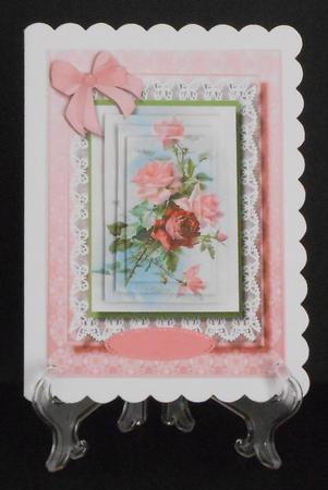 Lovely Pyramid Pink Roses on Butterfly Lace  by Joan Prince