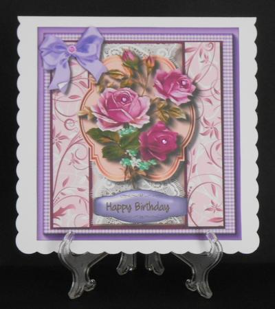Lilac / Pink Roses in a Gingham Frame  by Joan Prince