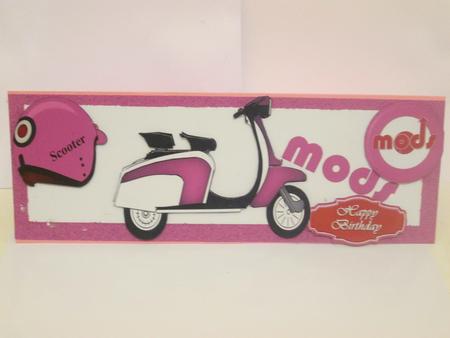 The Mods Pink Scooter with Helmet Dl by JOANNA HOGGER