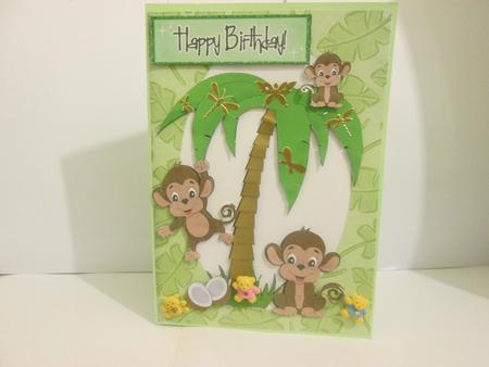 Playful Monkeys in Palm Tree by JOANNA HOGGER