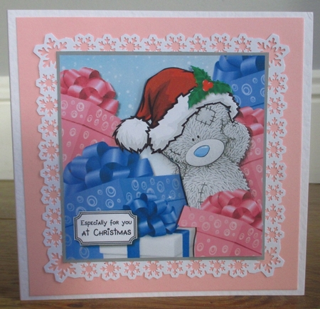 Tatty Teddy Surrounded by Christmas Gifts by Johanna Lambert