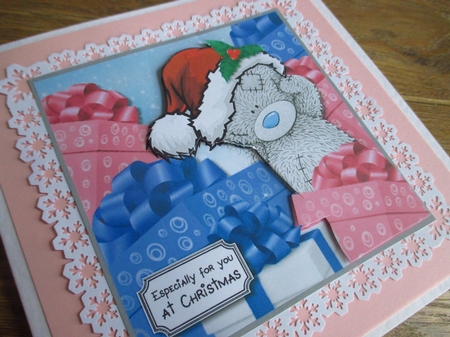 Tatty Teddy Surrounded by Christmas Gifts by Johanna Lambert